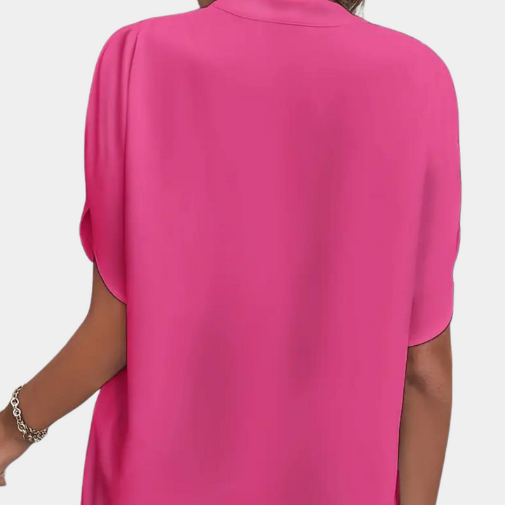 Roze effen dames blouse met v-hals en korte mouw